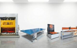 Industrial press machine, transfer table, and supporting workshop equipment in a production area
