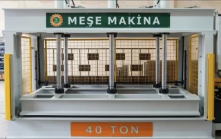 Meşe Makina 40-ton hydraulic press with a front pressing area, safety guards, and side control panel.